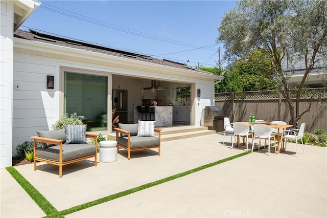 212 E 19th St, Costa Mesa, CA 92627 - view of patio / terrace with a grill, ceiling fan, and outdoor dining area