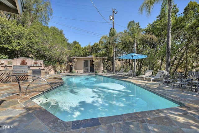 9999 Wornom Ave, Sunland, CA 91040 - outdoor pool featuring a patio, area for grilling, and an outdoor structure