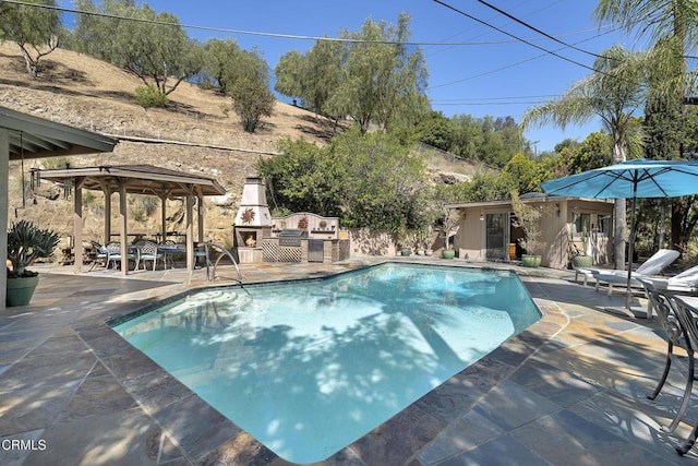 9999 Wornom Ave, Sunland, CA 91040 - swimming pool featuring a fireplace, a gazebo, and a patio area
