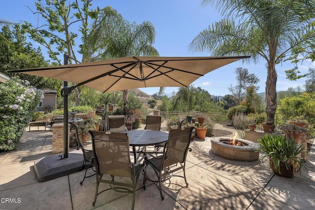 9999 Wornom Ave, Sunland, CA 91040 - view of patio / terrace featuring an outdoor fire pit and outdoor dining space