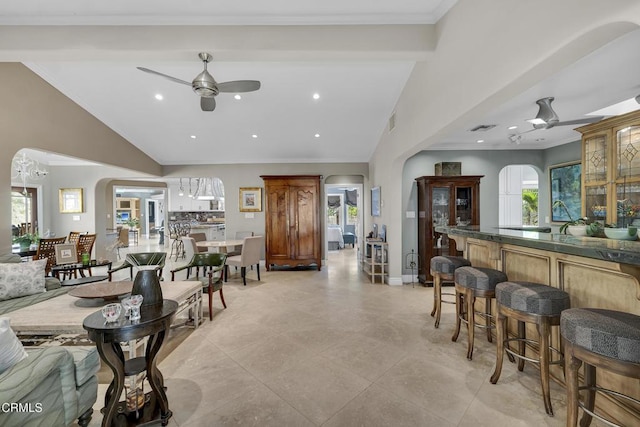 9999 Wornom Ave, Sunland, CA 91040 - living room featuring arched walkways, ceiling fan, vaulted ceiling, ornamental molding, and recessed lighting