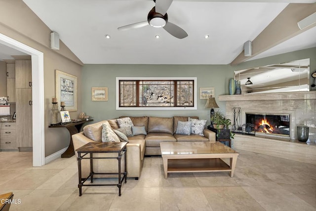 9999 Wornom Ave, Sunland, CA 91040 - living area featuring vaulted ceiling, ceiling fan, and a glass covered fireplace