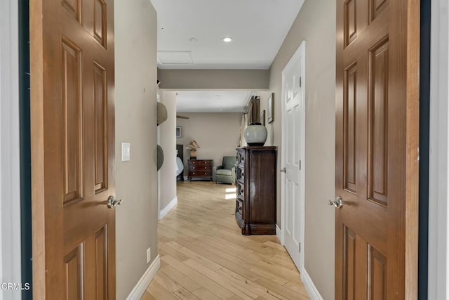 9999 Wornom Ave, Sunland, CA 91040 - corridor featuring attic access, light wood-type flooring, and recessed lighting