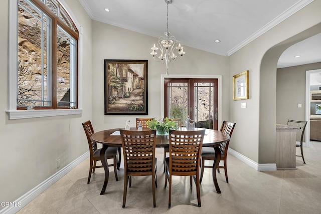 9999 Wornom Ave, Sunland, CA 91040 - dining space featuring a chandelier, arched walkways, lofted ceiling, recessed lighting, and crown molding