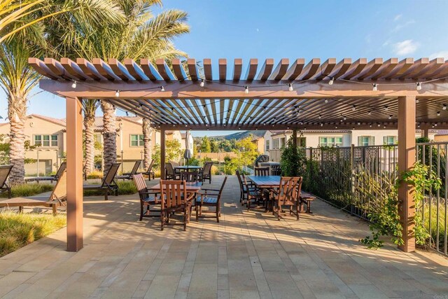 11015 Peyton Way, San Diego, CA 92129 - view of patio featuring a pergola and outdoor dining area
