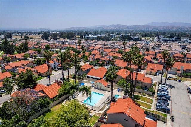 1407 Sycamore Ln, San Bernardino, CA 92408 - aerial view of residential area featuring a pool and a mountain backdrop