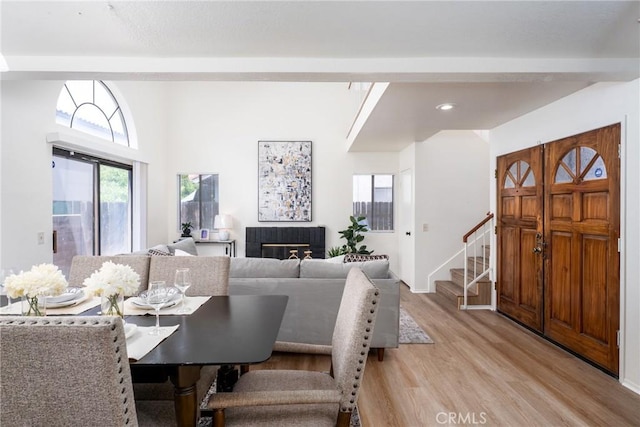 1407 Sycamore Ln, San Bernardino, CA 92408 - dining area featuring light wood finished floors, stairway, and recessed lighting