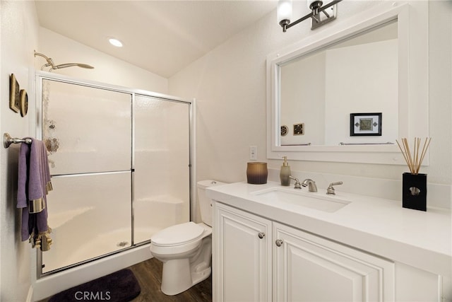 635 Boquest Blvd, Paradise, CA 95969 - full bathroom with vanity, a stall shower, wood finished floors, lofted ceiling, and recessed lighting