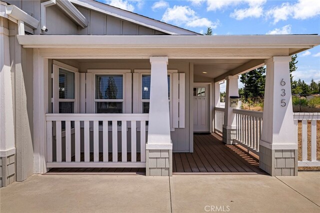 635 Boquest Blvd, Paradise, CA 95969 - property entrance with a porch and board and batten siding