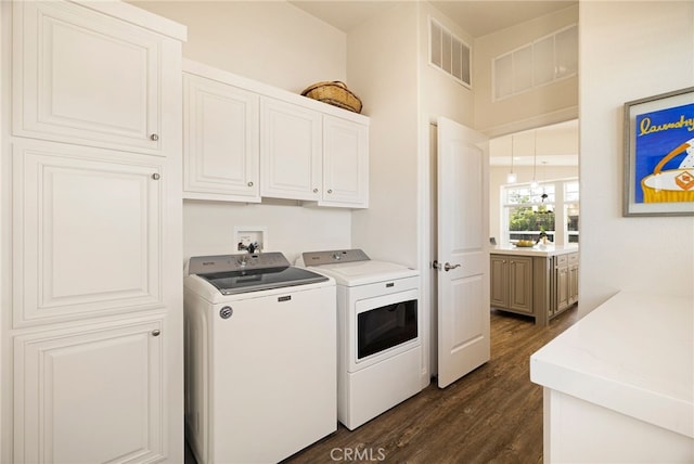 635 Boquest Blvd, Paradise, CA 95969 - laundry area with washing machine and clothes dryer, cabinet space, and dark wood finished floors