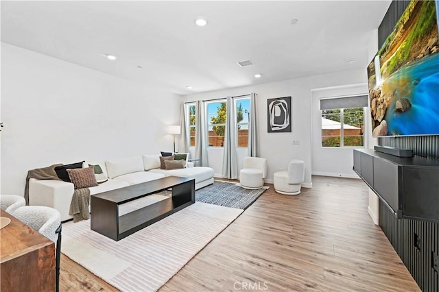5680 Kate Way Unit 5, Fontana, CA 92336 - living area featuring wood finished floors and recessed lighting