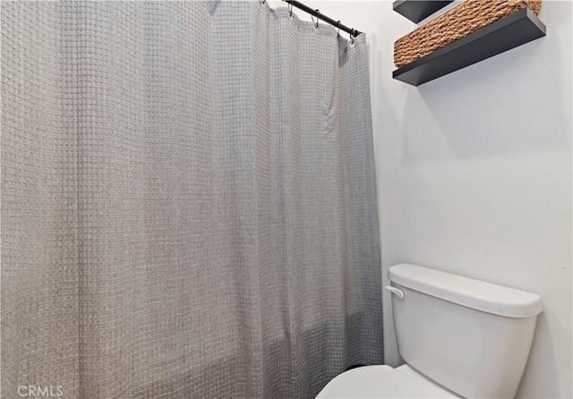 5680 Kate Way Unit 5, Fontana, CA 92336 - bathroom featuring curtained shower