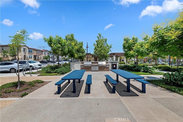5680 Kate Way Unit 5, Fontana, CA 92336 - surrounding community featuring an outdoor kitchen and a residential view