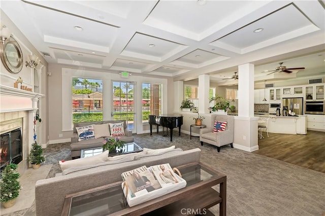 5680 Kate Way Unit 5, Fontana, CA 92336 - living area featuring healthy amount of natural light, ceiling fan, a fireplace, coffered ceiling, and recessed lighting