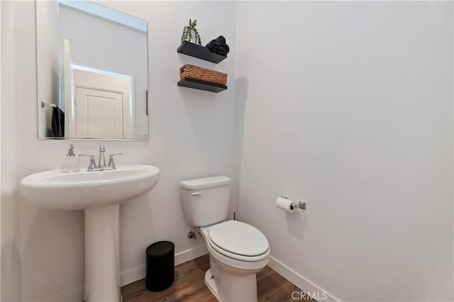 5680 Kate Way Unit 5, Fontana, CA 92336 - bathroom featuring toilet and wood finished floors