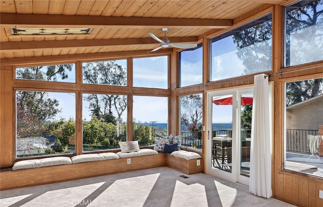 21521 Anns Ln, Laguna Beach, CA 92651 - sunroom / solarium featuring carpet floors, a wooden ceiling with exposed beams, a towering ceiling, and a water view