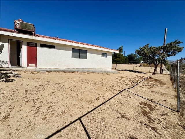 2748 Delmar Ave, Mojave, CA 93501 - view of side of home featuring stucco siding