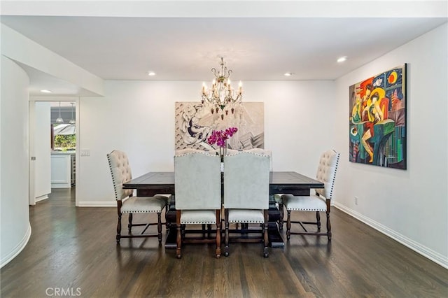 10411 Windtree Dr, Los Angeles, CA 90077 - dining space with wood finished floors, a chandelier, and recessed lighting