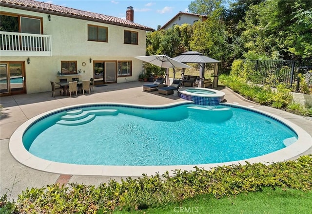10411 Windtree Dr, Los Angeles, CA 90077 - view of swimming pool featuring a patio, an outdoor hangout area, a gazebo, outdoor dining area, and a pool with connected hot tub