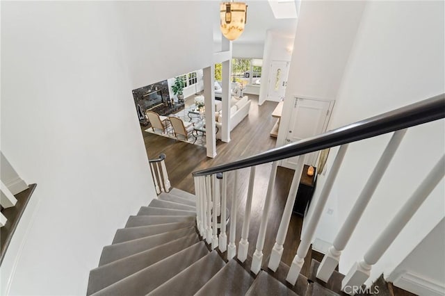 10411 Windtree Dr, Los Angeles, CA 90077 - stairway with wood finished floors