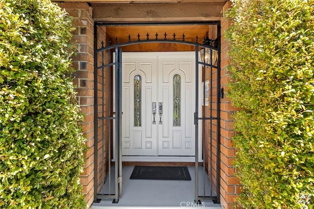 10411 Windtree Dr, Los Angeles, CA 90077 - view of exterior entry with brick siding