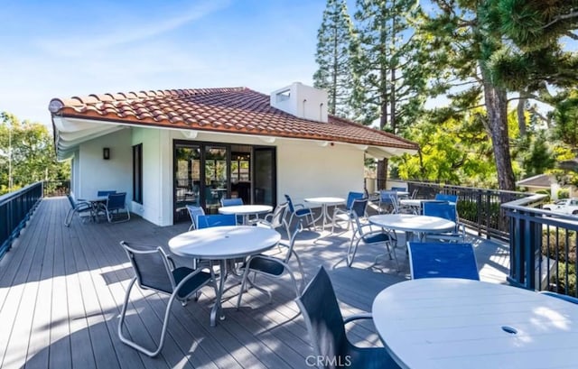 10411 Windtree Dr, Los Angeles, CA 90077 - wooden terrace featuring outdoor dining space