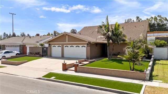 4360 E Addington Dr, Anaheim, CA 92807 - view of front of property featuring a garage, stucco siding, concrete driveway, and a front lawn