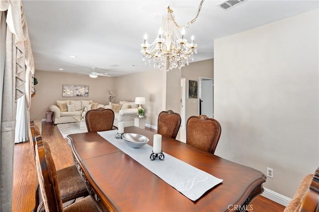 4360 E Addington Dr, Anaheim, CA 92807 - dining room with wood finished floors, a chandelier, and ceiling fan