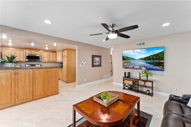 4360 E Addington Dr, Anaheim, CA 92807 - living room with recessed lighting, ceiling fan, and light tile patterned floors