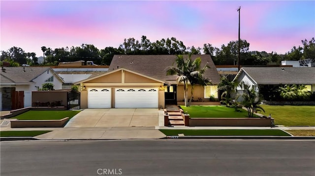 4360 E Addington Dr, Anaheim, CA 92807 - single story home featuring an attached garage, concrete driveway, stucco siding, and a gate