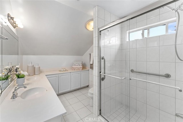 4360 E Addington Dr, Anaheim, CA 92807 - bathroom with double vanity, a shower stall, lofted ceiling, and tile patterned floors