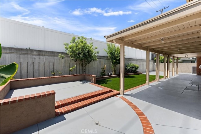 4360 E Addington Dr, Anaheim, CA 92807 - fenced backyard with a patio