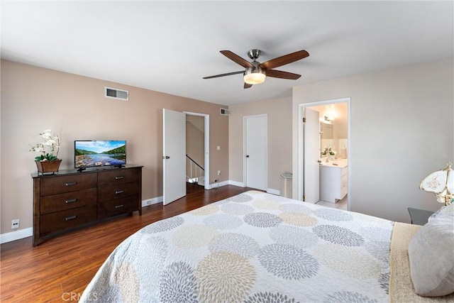 4360 E Addington Dr, Anaheim, CA 92807 - bedroom with dark wood-style flooring, connected bathroom, and a ceiling fan