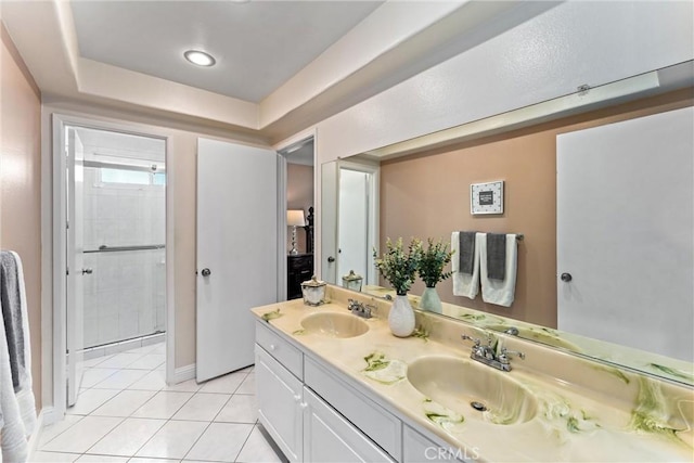 4360 E Addington Dr, Anaheim, CA 92807 - full bathroom featuring double vanity, tile patterned floors, and tiled shower