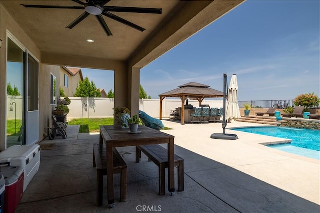18094 Olivenhain Dr, Riverside, CA 92508 - fenced backyard featuring a gazebo, a patio, outdoor dining space, and ceiling fan