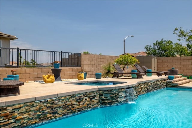 18094 Olivenhain Dr, Riverside, CA 92508 - view of swimming pool featuring a pool with connected hot tub and a patio