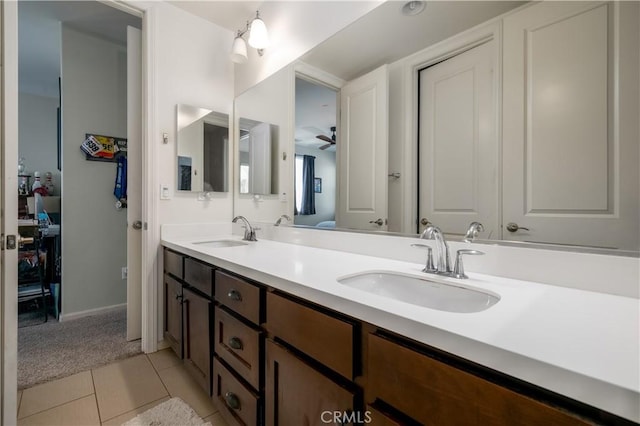 18094 Olivenhain Dr, Riverside, CA 92508 - bathroom featuring double vanity, tile patterned flooring, and a ceiling fan