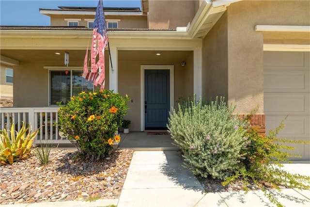 18094 Olivenhain Dr, Riverside, CA 92508 - entrance to property featuring stucco siding and a porch