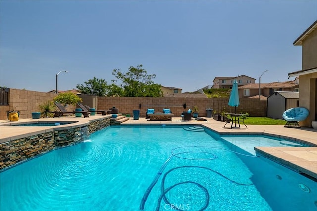 18094 Olivenhain Dr, Riverside, CA 92508 - view of swimming pool with a shed, a fenced backyard, a patio, and a pool with connected hot tub