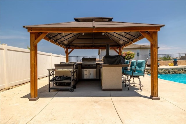 18094 Olivenhain Dr, Riverside, CA 92508 - fenced backyard with a gazebo, a patio area, and exterior kitchen