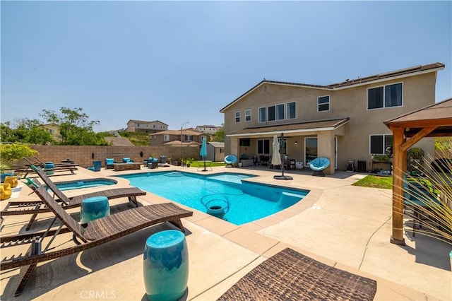 18094 Olivenhain Dr, Riverside, CA 92508 - view of swimming pool with an in-ground hot tub, a fenced backyard, and a patio