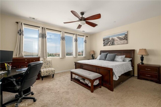 18094 Olivenhain Dr, Riverside, CA 92508 - bedroom with light carpet, an office area, and ceiling fan