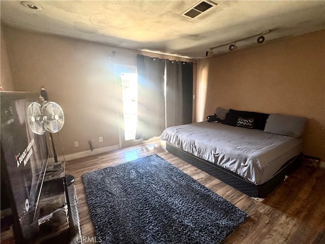401 S R St, Lompoc, CA 93436 - bedroom featuring wood finished floors and baseboards