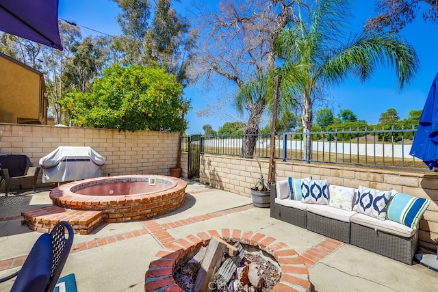 24412 Verena Ct, Mission Viejo, CA 92691 - fenced backyard featuring area for grilling, an outdoor living space with a fire pit, a patio area, and an outdoor hot tub