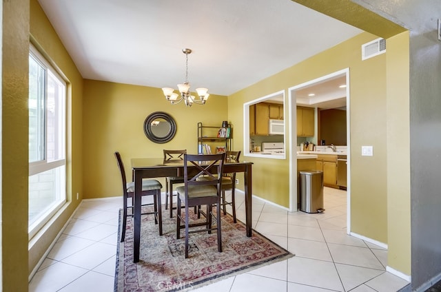 24412 Verena Ct, Mission Viejo, CA 92691 - dining room featuring plenty of natural light, a chandelier, and light tile patterned floors