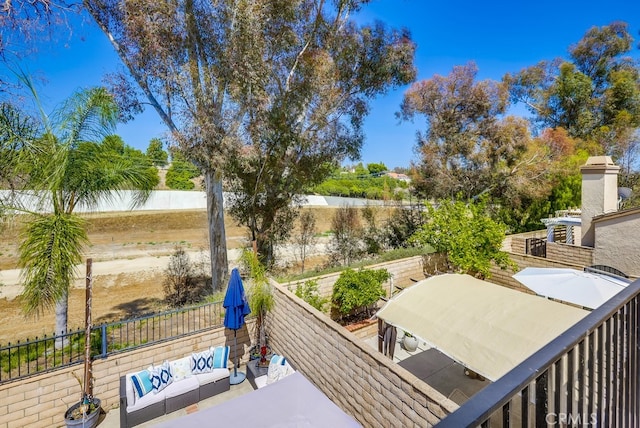 24412 Verena Ct, Mission Viejo, CA 92691 - fenced backyard featuring an outdoor hangout area, outdoor dining area, and a patio