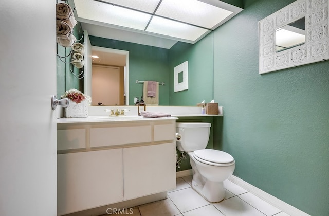24412 Verena Ct, Mission Viejo, CA 92691 - half bath with tile patterned floors, vanity, and a textured wall