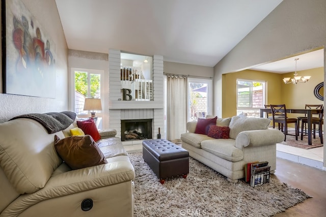 24412 Verena Ct, Mission Viejo, CA 92691 - living room featuring a chandelier, plenty of natural light, lofted ceiling, and a fireplace