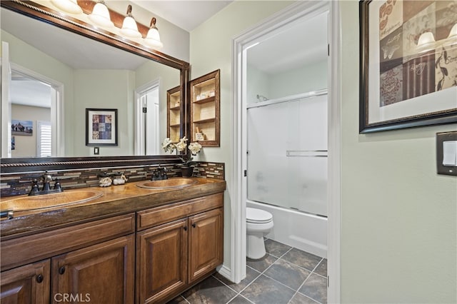 28385 Mirabelle Ln, Saugus, CA 91350 - full bath featuring double vanity, enclosed tub / shower combo, tile patterned floors, and tasteful backsplash