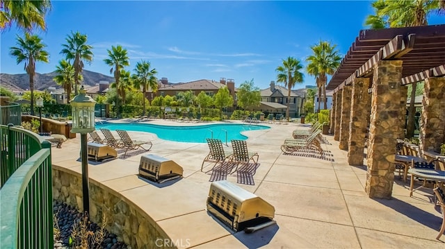 28385 Mirabelle Ln, Saugus, CA 91350 - community pool with a patio area, a residential view, and a mountain view
